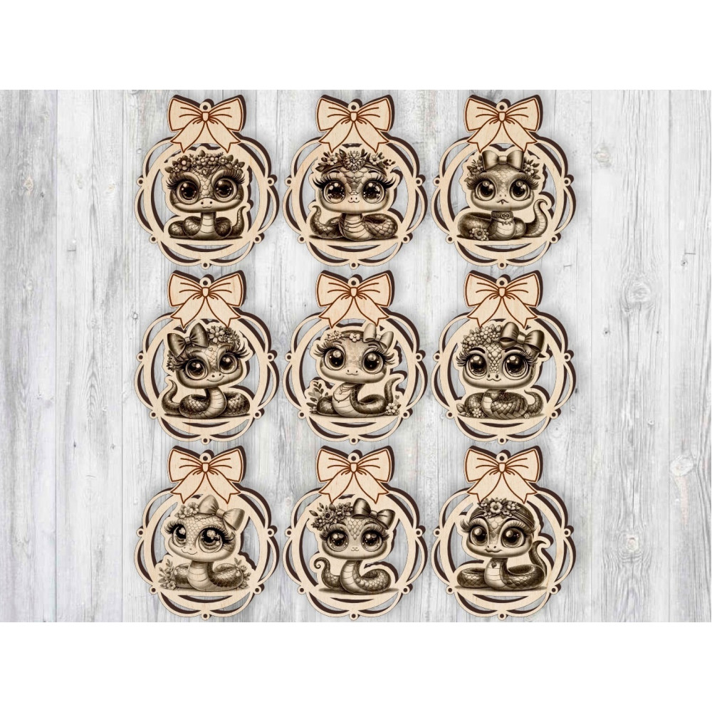 Елочные игрушки со змейками с бантом
